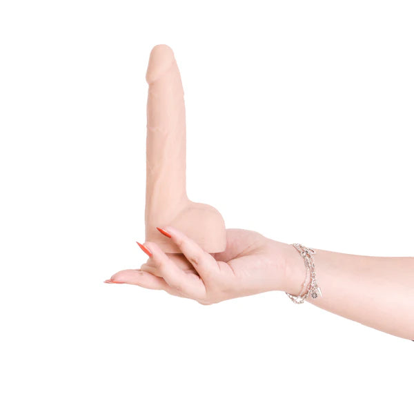 Naked Addiction 8.5-Inch Thrusting Dildo, Vanilla, Dildo Held Upwards in Right Hand