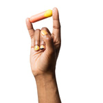 ROMP Riot Bullet Vibrator, Product Balanced Between Fingers