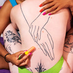 Romp Riot Bullet Vibrator, Partners Embraced Holding Bullet