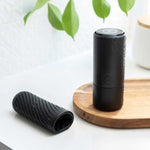 Arcwave Ghost Soft Silicone Stroker, Black, Stroker and Case on Bathroom Vanity