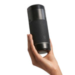 Arcwave Pow Silicone Stroker, Black, Product Held in Hand