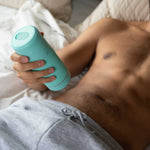 Arcwave Pow Silicone Stroker, Mint, Man Holding Stroker Case in Right Hand