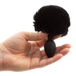 Pure Love Bunny Tail Silicone Butt Plug, Black, Butt Plug in Hand