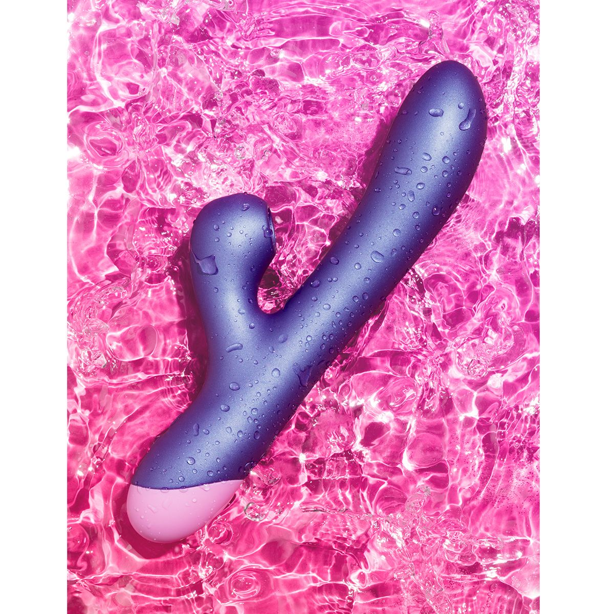 Romp Pulse Rabbit Vibrator on Pink Abstract