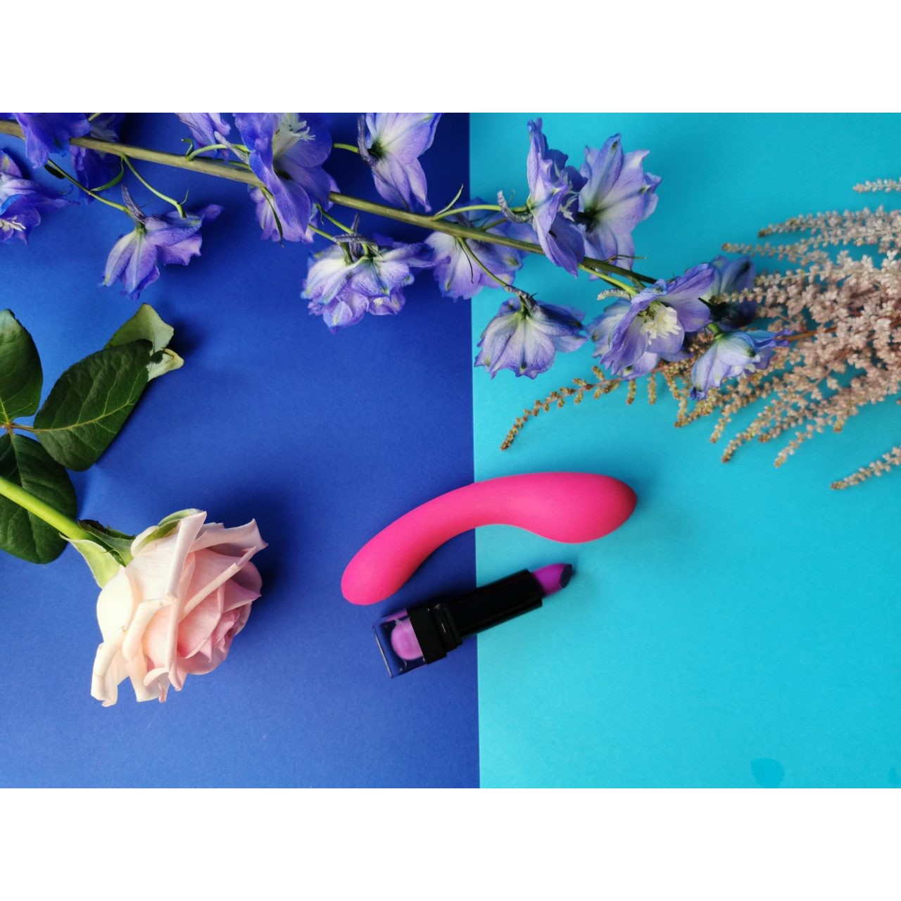 Swan The Mini Swan Wand Vibrator, Pink, Product with Lipstick and Floral Arrangements