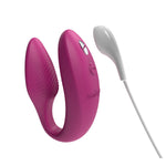 We-Vibe Sync 2 Couples Vibrator, Pink, Product with Magnetic Charger