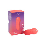 We-Vibe Touch X Clitoral Vibrator, Coral, Product Box and Clitoral Vibrator