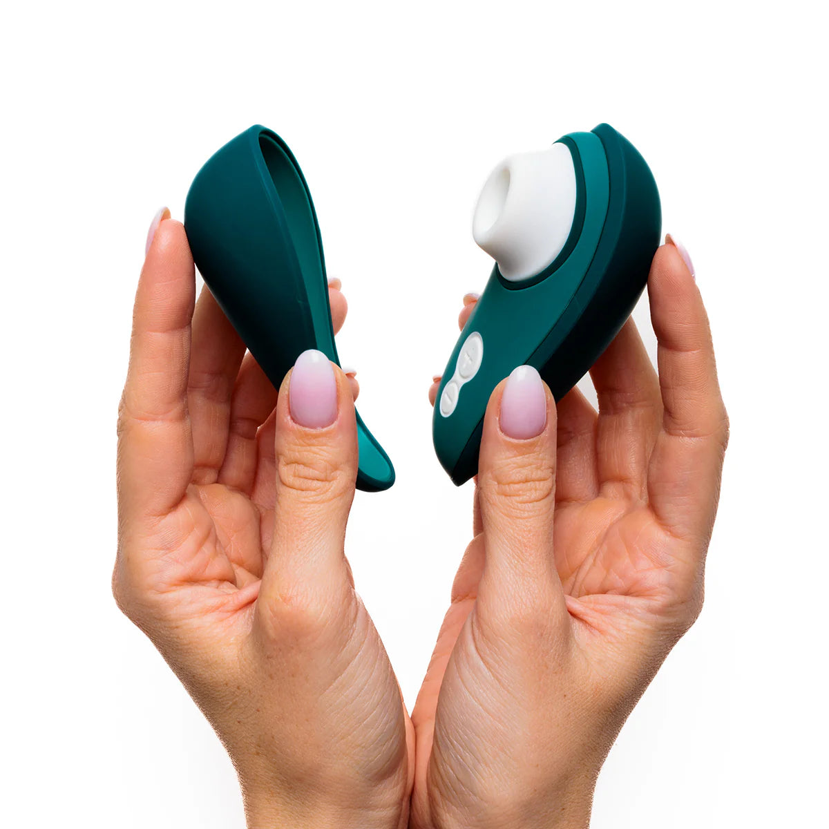 Womanizer Liberty 2 Clitoral Stimulator, Dark Petrol, Clitoral Stimulator in Right Hand and Cover Lid in Left Hand