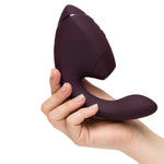 Womanizer Next Duo Clitoral Suction & G-Spot Vibrator, Dark Purple, Vibrator Gripped in Hand