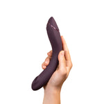 Womanizer OG G-Spot Vibrator, Aubergine, Vibrator Held Upwards in Right Hand